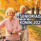 Senioriada 2025. Na plakacie jest kobieta prowadząca rower, za nią mężczyzna, obok nich napis Senioriada Konin 2025